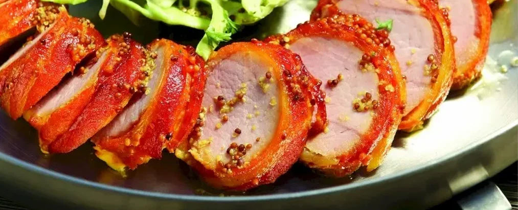 Schweinefilet im Speckmantel mit Krautsalat